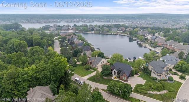 10993 Stoney Point Dr, South Lyon, MI 48178 - aerial overview of property's location featuring a large body of water and nearby suburban area