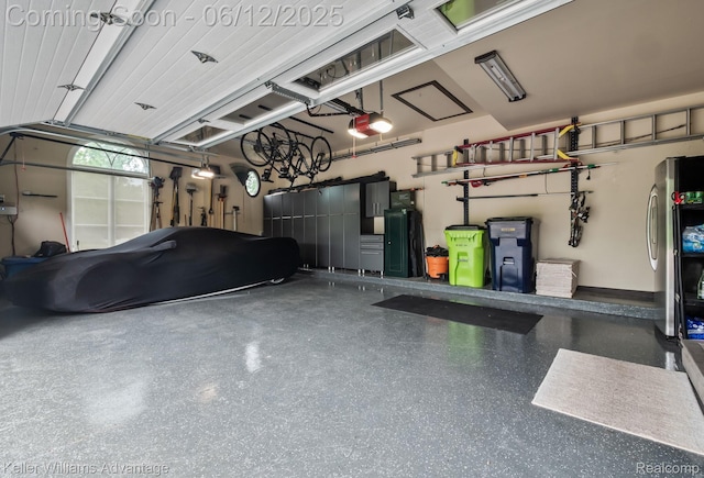 10993 Stoney Point Dr, South Lyon, MI 48178 - garage with a garage door opener