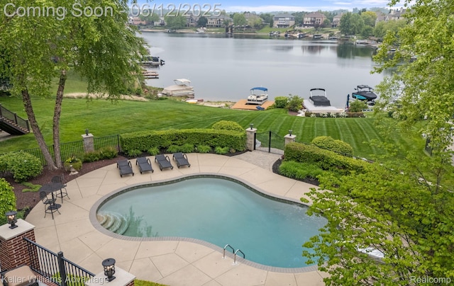 10993 Stoney Point Dr, South Lyon, MI 48178 - view of swimming pool with a patio and a water view