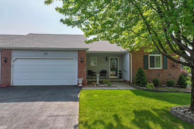 1273 Crystal Pointe Cir, Fenton, MI 48430 - view of front of property featuring brick siding, driveway, a front yard, an attached garage, and a shingled roof