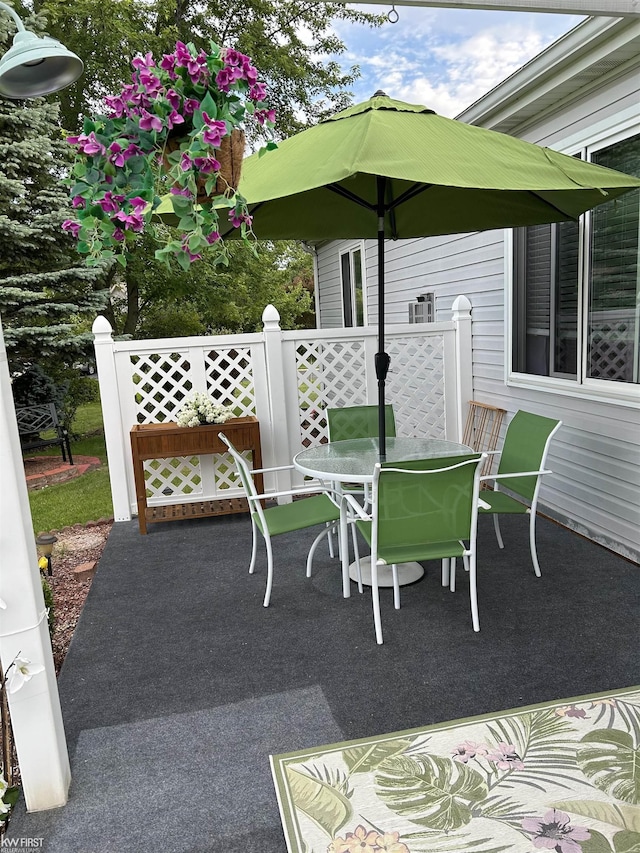 1273 Crystal Pointe Cir, Fenton, MI 48430 - view of patio / terrace with outdoor dining area