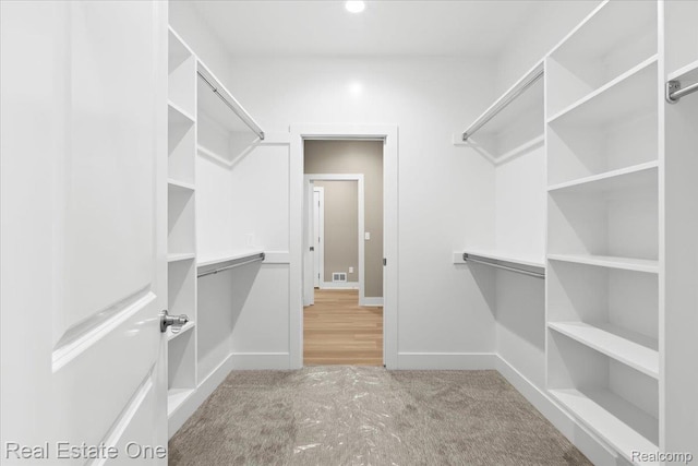 2763 Clivedon Rd, Howell, MI 48843 - walk in closet featuring carpet floors
