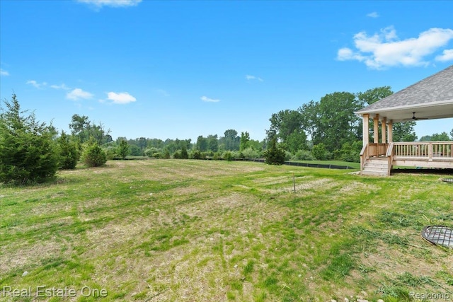 2763 Clivedon Rd, Howell, MI 48843 - view of yard featuring a deck