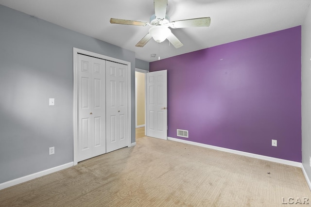345 Alexander Dr, Adrian, MI 49221 - unfurnished bedroom featuring baseboards, a closet, and ceiling fan