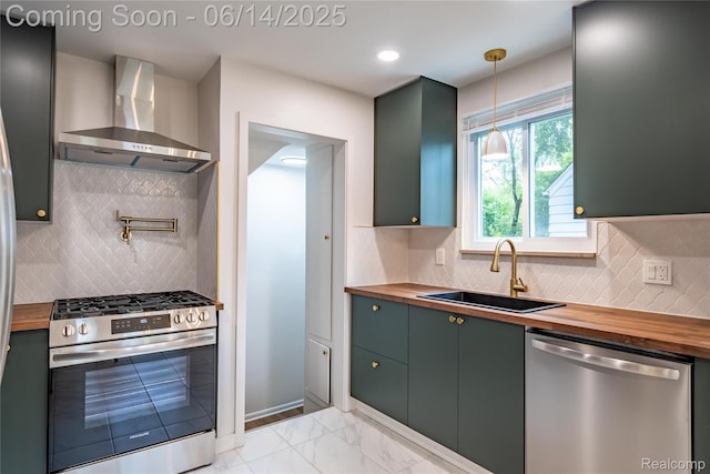 17330 Five Points St E, Dearborn, MI 48240 - kitchen with wood counters, stainless steel appliances, wall chimney exhaust hood, and tasteful backsplash