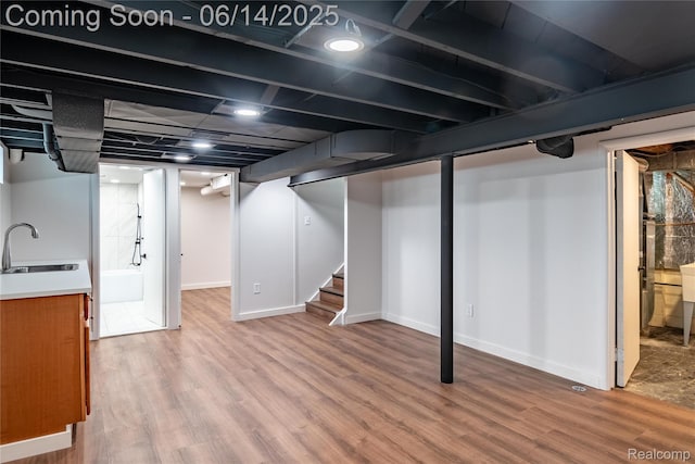 17330 Five Points St E, Dearborn, MI 48240 - finished below grade area featuring light wood-style flooring and stairs