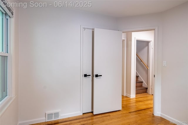 17330 Five Points St E, Dearborn, MI 48240 - unfurnished bedroom with light wood-style floors and baseboards