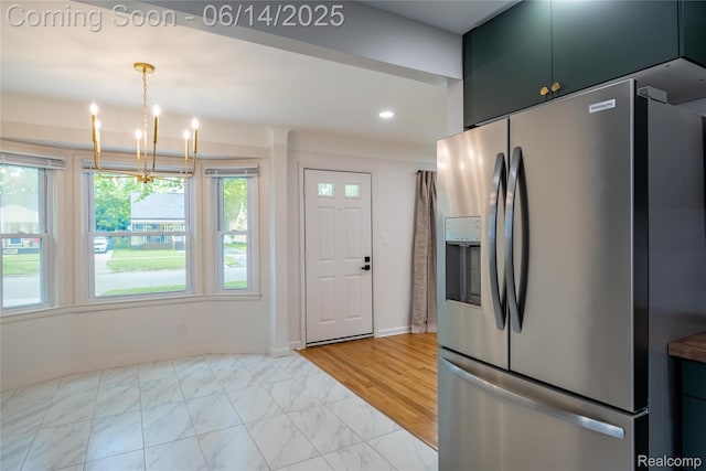 17330 Five Points St E, Dearborn, MI 48240 - kitchen with stainless steel refrigerator with ice dispenser, a chandelier, light marble finish flooring, recessed lighting, and decorative light fixtures