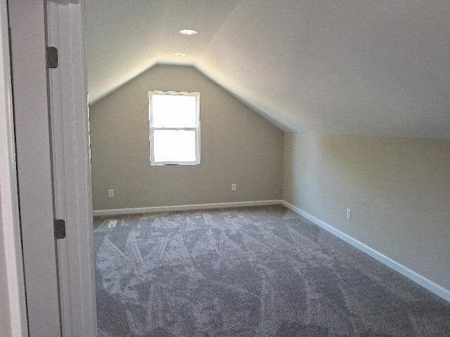 243 Lake Dr, Muskegon, MI 49441 - bonus room with lofted ceiling and carpet
