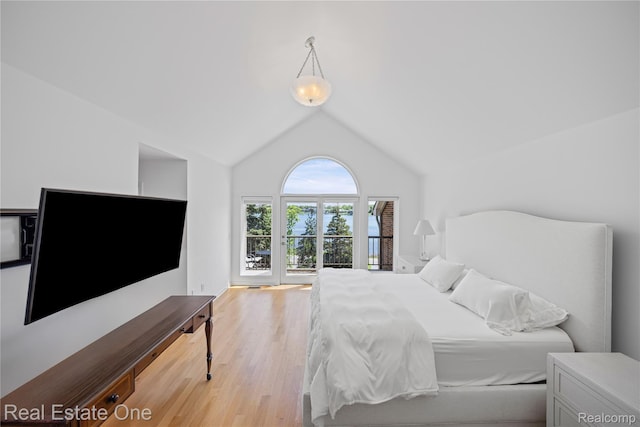 3856 Pine Lake Knoll Dr, West Bloomfield, MI 48324 - bedroom featuring vaulted ceiling and wood finished floors