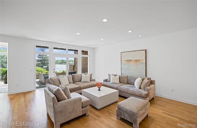 3856 Pine Lake Knoll Dr, West Bloomfield, MI 48324 - living room featuring recessed lighting, light wood-type flooring, and baseboards