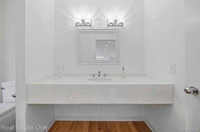 3856 Pine Lake Knoll Dr, West Bloomfield, MI 48324 - half bath with toilet, wood finished floors, and vanity