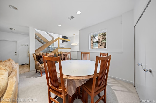 3856 Pine Lake Knoll Dr, West Bloomfield, MI 48324 - dining space featuring light carpet, stairs, and recessed lighting