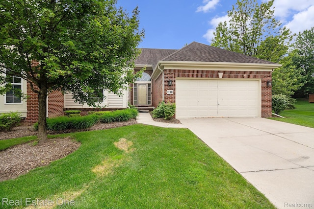 1130 Andover Cir, Commerce Twp, MI 48390 - view of front of home featuring an attached garage, concrete driveway, a front yard, brick siding, and a shingled roof