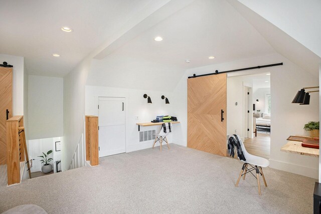 2958 S Edgar Rd, Mason, MI 48854 - carpeted office space featuring a barn door, vaulted ceiling, recessed lighting, and baseboards