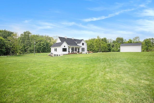 2958 S Edgar Rd, Mason, MI 48854 - view of green lawn with an outdoor structure
