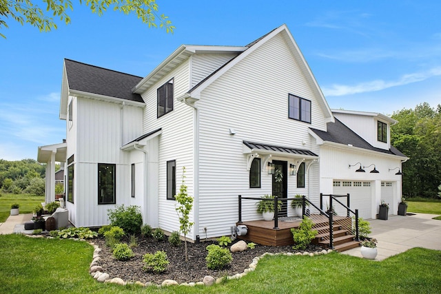 2958 S Edgar Rd, Mason, MI 48854 - view of home's exterior with driveway, a yard, and a garage