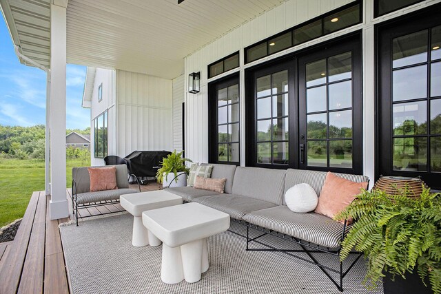 2958 S Edgar Rd, Mason, MI 48854 - view of patio / terrace with french doors and outdoor lounge area