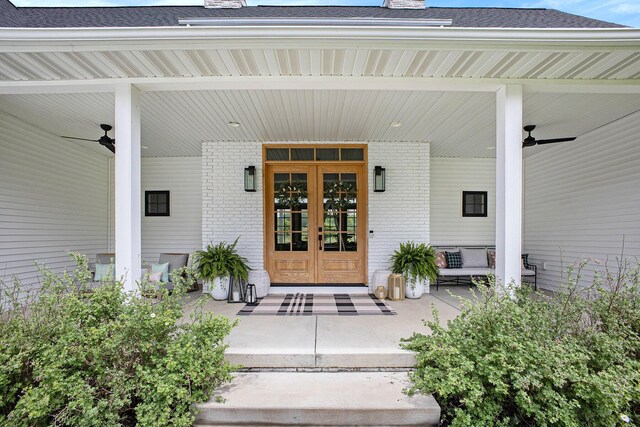 2958 S Edgar Rd, Mason, MI 48854 - doorway to property featuring brick siding, a porch, and a ceiling fan