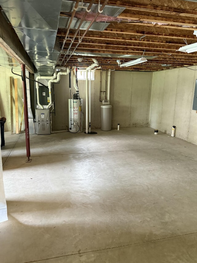 12 Picardy Pl, Hillsdale, MI 49242 - basement featuring gas water heater, heating unit, electric panel, and a water softener