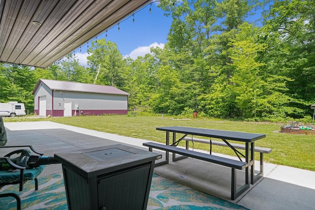 1304 Michillinda Rd, Muskegon, MI 49445 - view of patio / terrace with an outbuilding