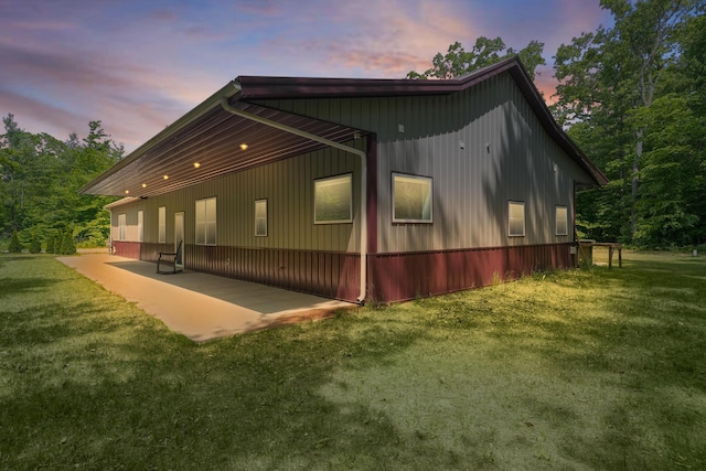 1304 Michillinda Rd, Muskegon, MI 49445 - view of home's exterior featuring a yard and a patio