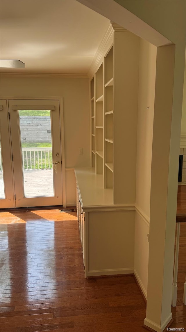 413 Covington Ct Unit 81, Northville, MI 48168 - interior space featuring hardwood / wood-style flooring and ornamental molding