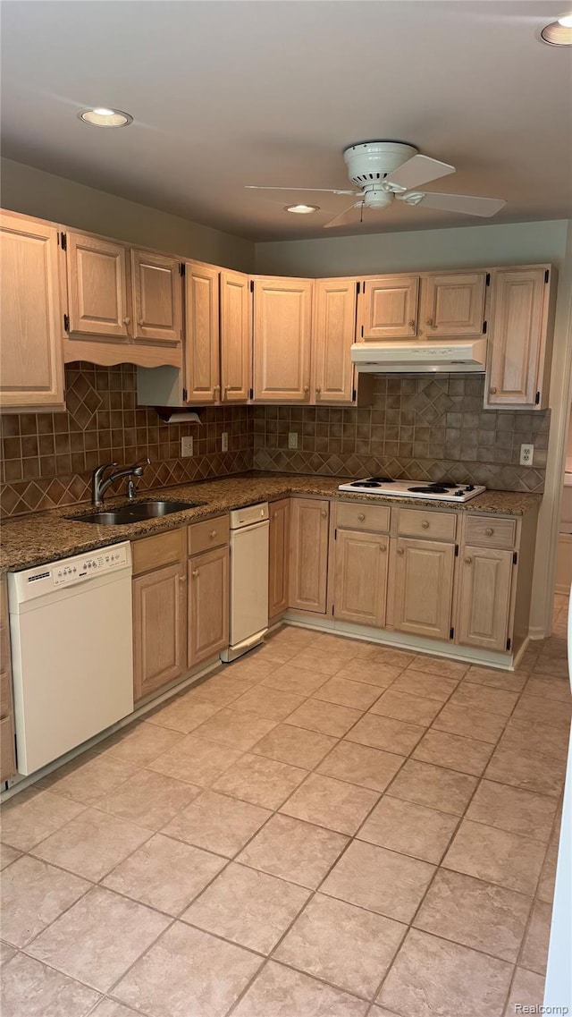 413 Covington Ct Unit 81, Northville, MI 48168 - kitchen featuring white appliances, under cabinet range hood, decorative backsplash, light brown cabinetry, and recessed lighting