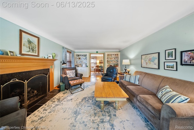 713 Claremont St, Dearborn, MI 48124 - living area with a fireplace and built in shelves