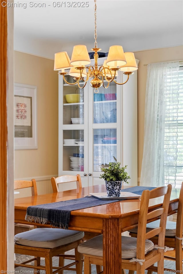 713 Claremont St, Dearborn, MI 48124 - dining space with a chandelier