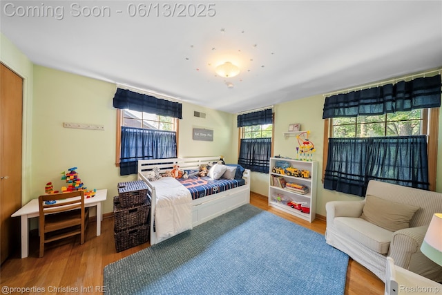 713 Claremont St, Dearborn, MI 48124 - bedroom featuring wood finished floors