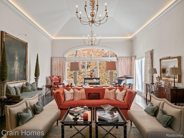 20 Hidden Rdg, Bloomfield Hills, MI 48304 - living area featuring a chandelier, a raised ceiling, wood finished floors, ornamental molding, and a high ceiling