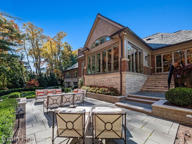 20 Hidden Rdg, Bloomfield Hills, MI 48304 - view of patio / terrace featuring outdoor lounge area and stairs
