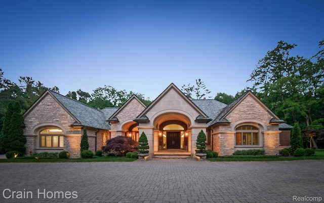 20 Hidden Rdg, Bloomfield Hills, MI 48304 - french country style house featuring stone siding