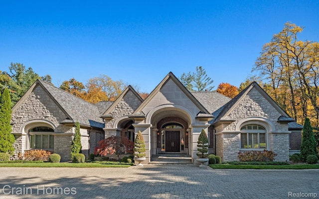 20 Hidden Rdg, Bloomfield Hills, MI 48304 - french country inspired facade with stone siding