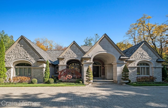 20 Hidden Rdg, Bloomfield Hills, MI 48304 - french country inspired facade with stone siding