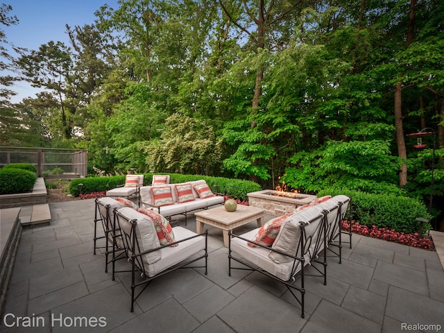 20 Hidden Rdg, Bloomfield Hills, MI 48304 - view of patio / terrace with an outdoor living space with a fire pit and view of wooded area