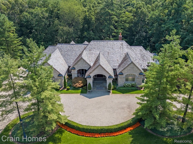 20 Hidden Rdg, Bloomfield Hills, MI 48304 - view of subject property featuring a heavily wooded area