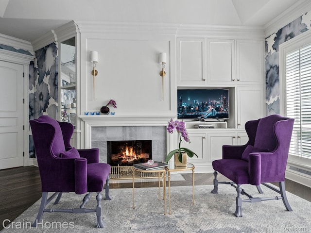 20 Hidden Rdg, Bloomfield Hills, MI 48304 - sitting room featuring a premium fireplace, plenty of natural light, ornamental molding, wood finished floors, and lofted ceiling