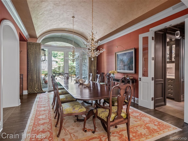 20 Hidden Rdg, Bloomfield Hills, MI 48304 - dining area featuring vaulted ceiling, french doors, wood finished floors, arched walkways, and a chandelier