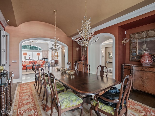 20 Hidden Rdg, Bloomfield Hills, MI 48304 - dining area featuring arched walkways, a chandelier, and vaulted ceiling