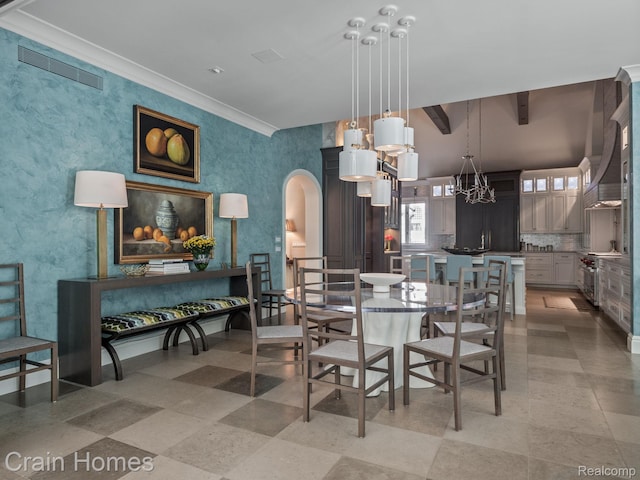 20 Hidden Rdg, Bloomfield Hills, MI 48304 - dining room featuring a chandelier, crown molding, and arched walkways