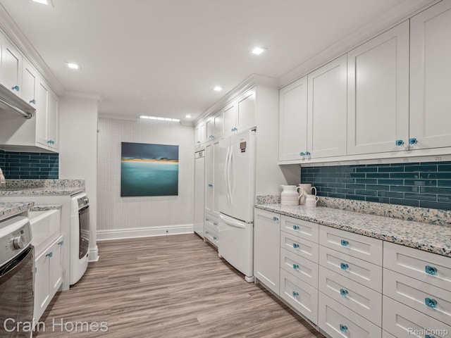 20 Hidden Rdg, Bloomfield Hills, MI 48304 - kitchen featuring freestanding refrigerator, white cabinetry, baseboards, and recessed lighting