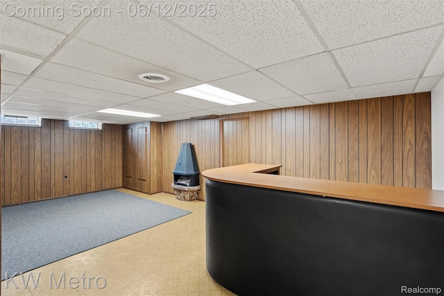 20320 Martin Rd, Saint Clair Shores, MI 48081 - indoor dry bar featuring a paneled ceiling, wooden walls, and light floors
