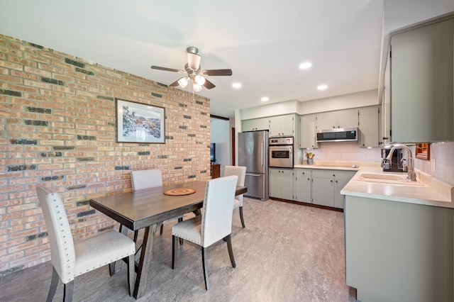 2794 W Park Ln, Benton Harbor, MI 49022 - dining area featuring ceiling fan, brick wall, light wood-style floors, and recessed lighting