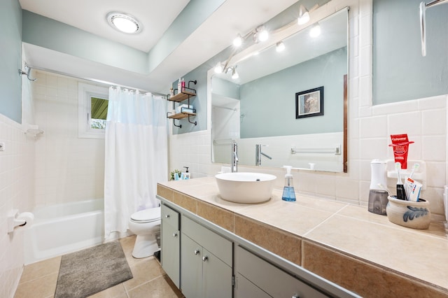 2794 W Park Ln, Benton Harbor, MI 49022 - full bath with tile walls, vanity, toilet, shower / bathtub combination with curtain, and tile patterned flooring