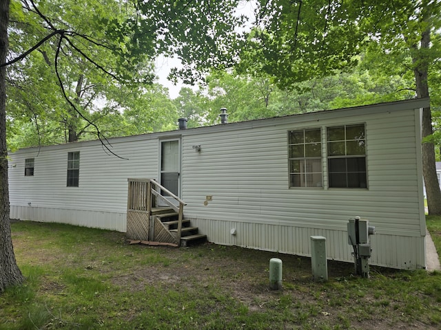 2317 Shamrock Ln, Muskegon, MI 49442 - view of rear view of property