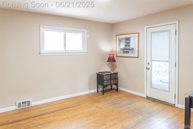 2856 Central St, Berkley, MI 48072 - foyer entrance with wood finished floors and baseboards