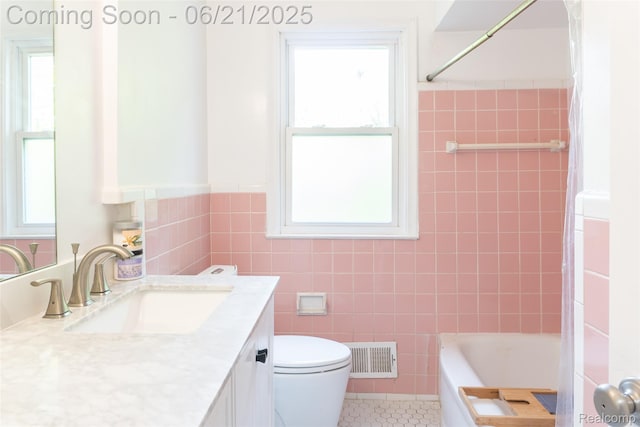 2856 Central St, Berkley, MI 48072 - bathroom featuring vanity, tile walls, tile patterned floors, and wainscoting