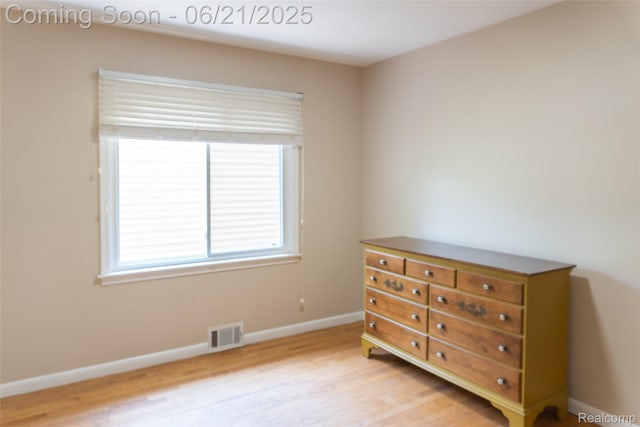 2856 Central St, Berkley, MI 48072 - bedroom with light wood-style flooring and baseboards